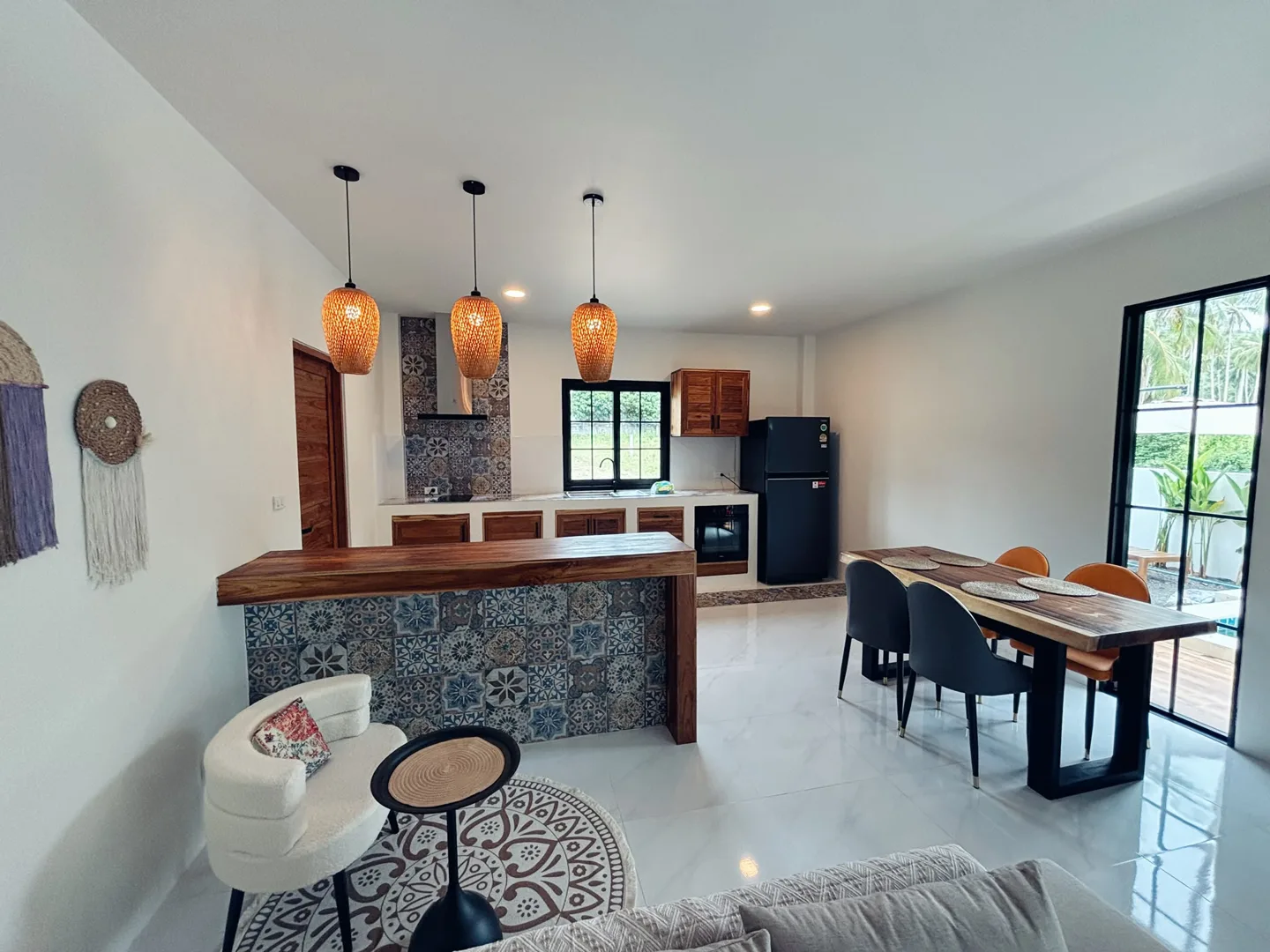 Kitchen with breakfast bar and dining space